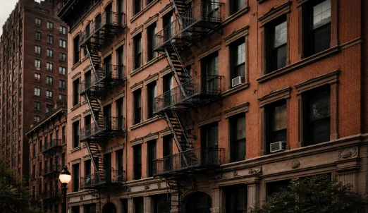 Multifamily apartment building representing value-add investment opportunities in Massachusetts and New York